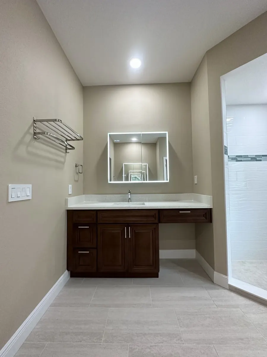 Wood vanity & illuminated mirror