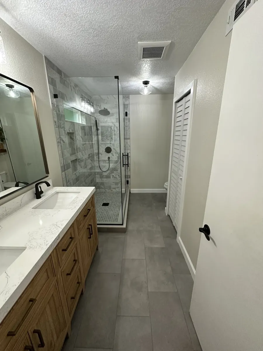 Glass shower & wood vanity